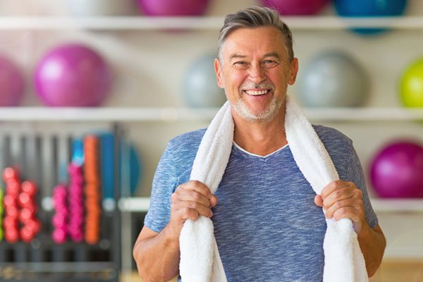 Man feeling energetic and healthy after treatment